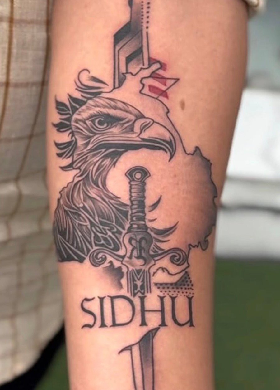 Eagle and dagger tattoo design