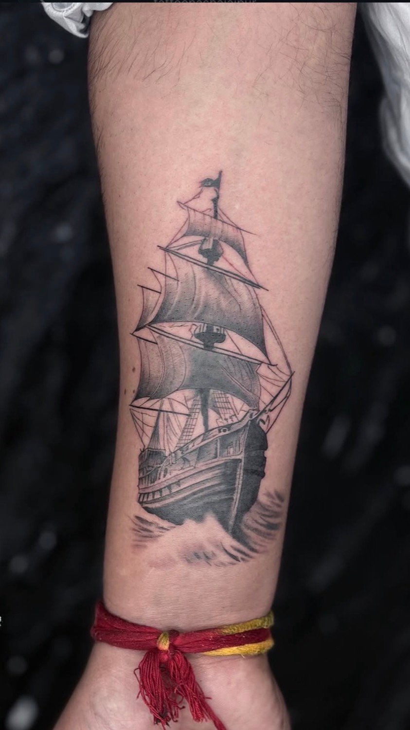 Detailed ship tattoo